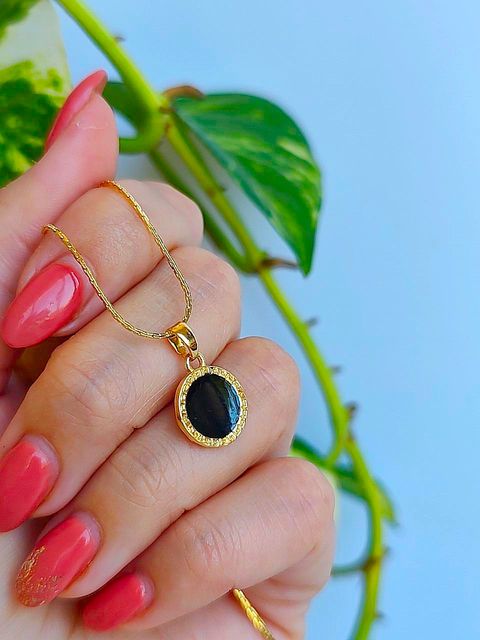 Conjunto medalla baño de oro 18k 