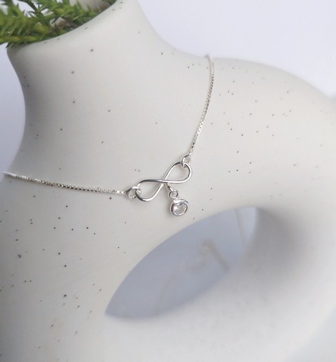 Conjunto infinito con mini punto de luz. Plata 925