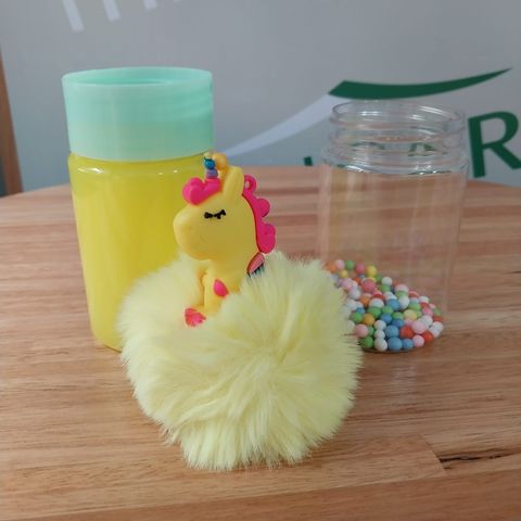 Slime en pote con  unicornio pompon y esferas 