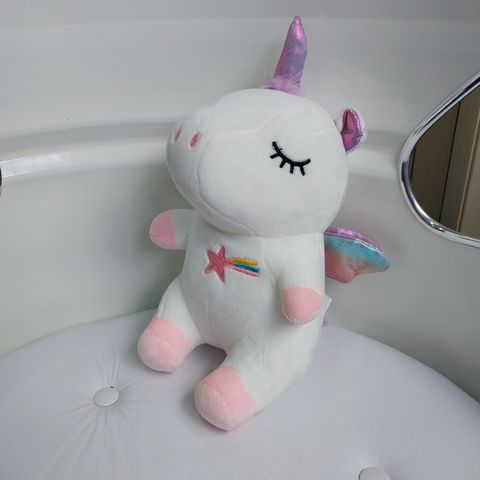 peluche unicornio de 27cm de alto