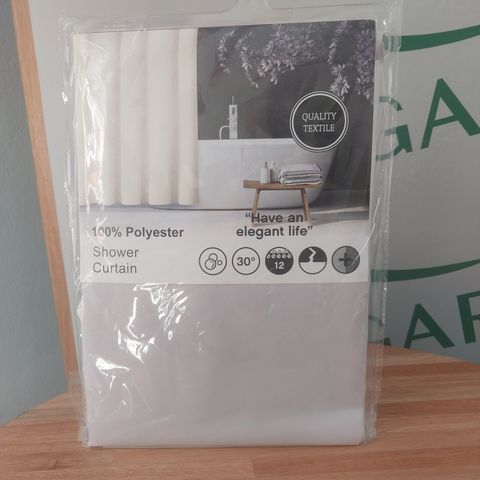 Cortina de tela para ducha.