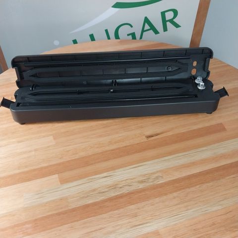 Selladora de bolsas al vacío automática.