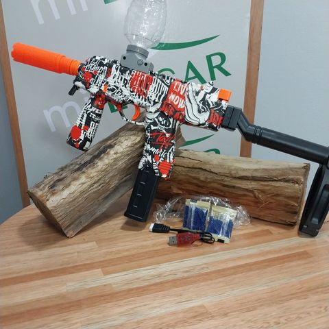 Arma roja juguete recargable