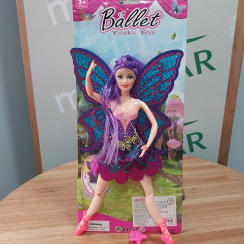 Muñeca bailarina con movimientos en brazos y piernas