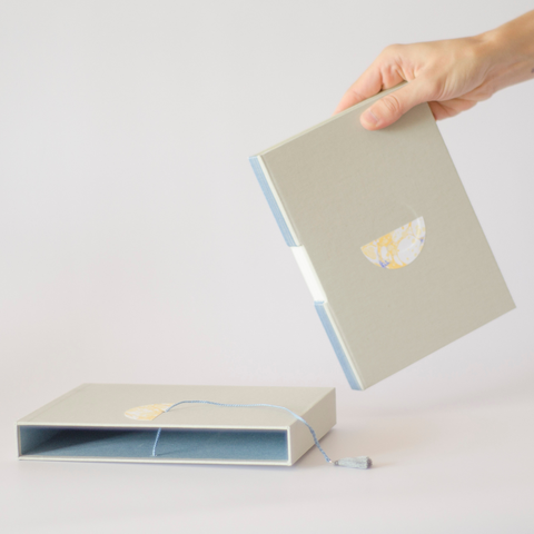 Encuadernación de ojal y estuche