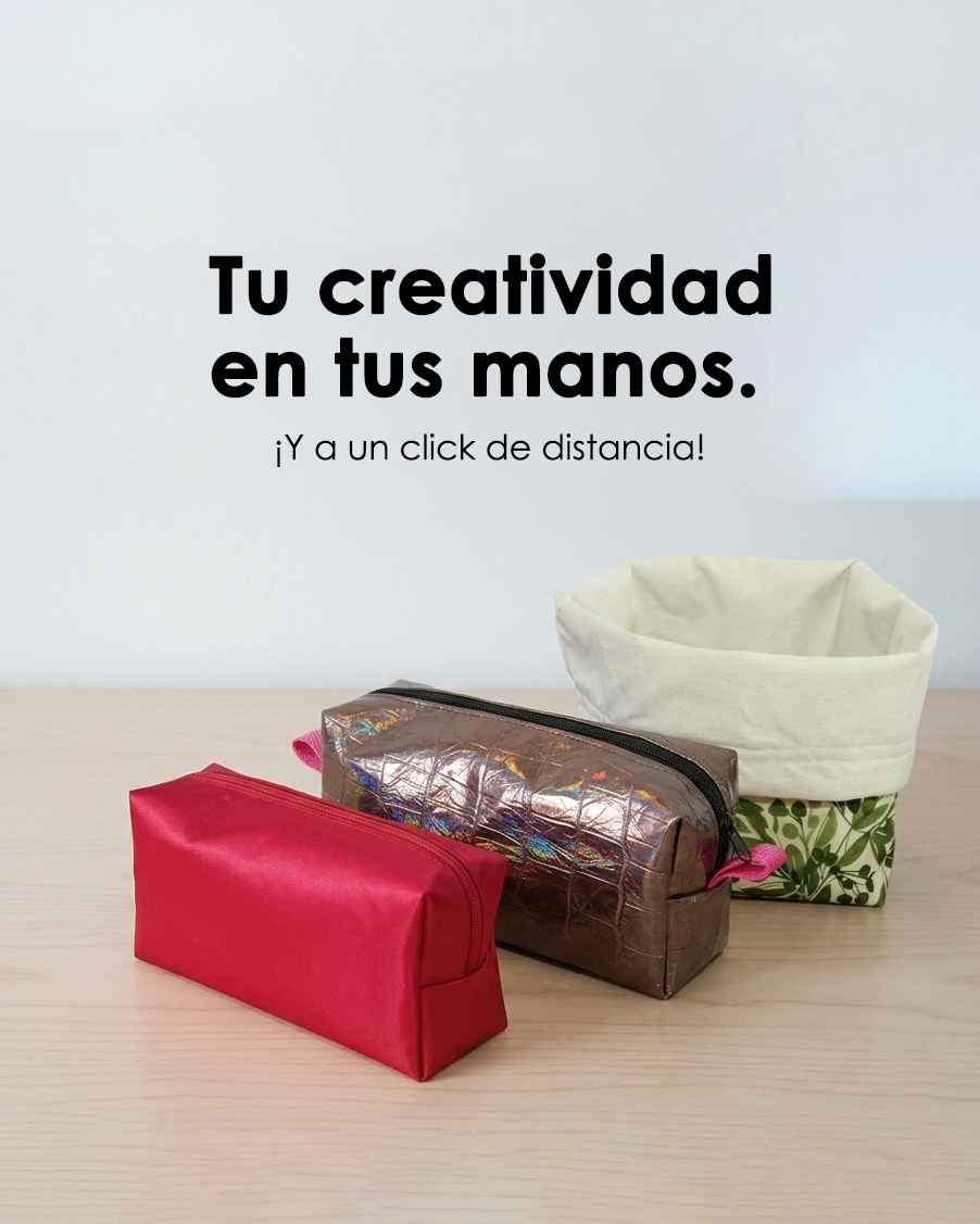 Tres neceser y cartucheras sobre una mesa a modo de presentacion